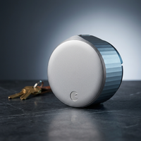 Wifi Smart Lock Silver (Retrofits over Existing Deadbolt) — Studio Shot